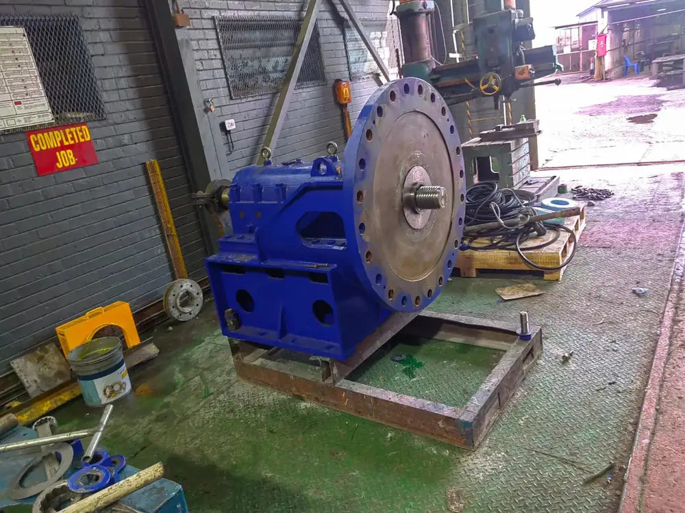 Blue pump stripped for refurbishment in the workshop